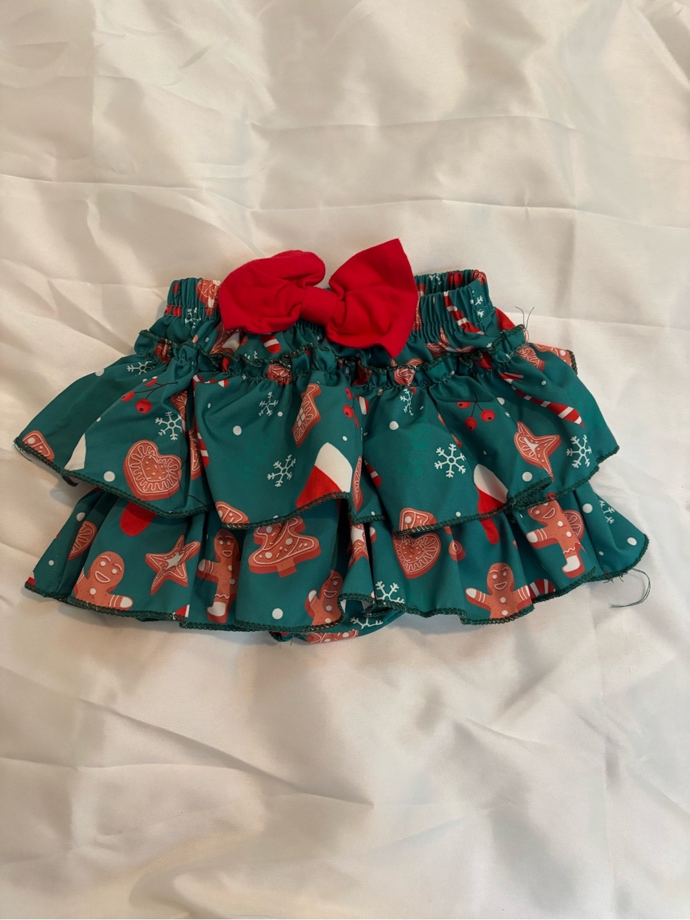 Girls Holiday Ruffled Skirt with Red Bow gingerbread theme